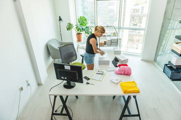 Young woman working in her home office

