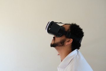 Man wearing VR headset looking up