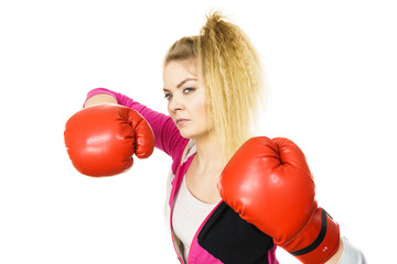 Woman wearing boxing gloves