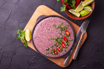 Mexican red bean puree soup with lime, parsley and chilli pepper.