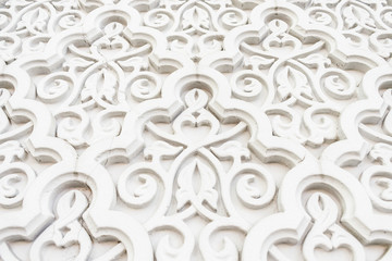Arabian Muslim Islamic white oriental national pattern with relief elements. Textured white wall, mosque decor element.