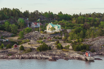 Fototapeta na wymiar 10 July 2018 Stockholm, Sweden: Summer house in one of the thousands of little islands of the Archipelago of Stockholm, Sweden