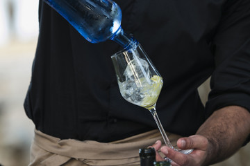 pouring water in glass