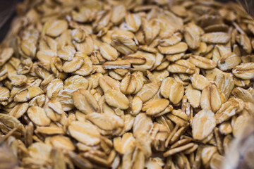 Close-up of oat flakes on black background