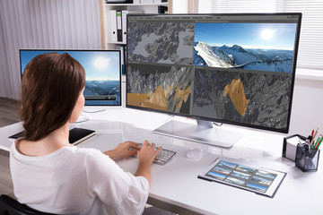 Woman Rendering 3D Landscape On Computer