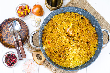 Preparation of pilaf with lamb in frying pan