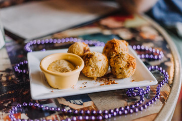 Cajun appetizer, House made Boudin Balls served with creole mustard