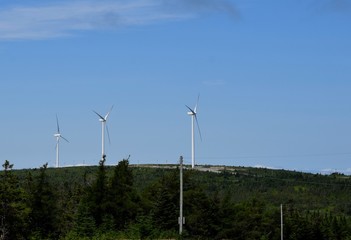 landscape around the Irish Loop;  looking uphill towards the Windmills at Fermeuse Wind farms, Avalon peninsula,  Newfoundland Canada