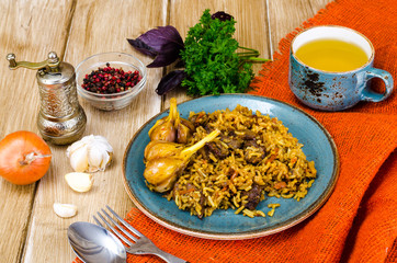 Blue plate with pilaf and meat
