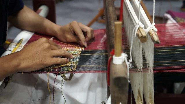 Handmade traditional silk weaving in Asia video