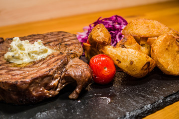 Delicious meat with vegetables, cooked on the grill. Fresh and juicy food