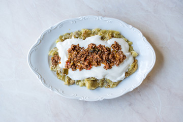 Turkish Ali Nazik Kebab with Yogurt, Minced Meat and Roasted Eggplant or Aubergine / Kebap.