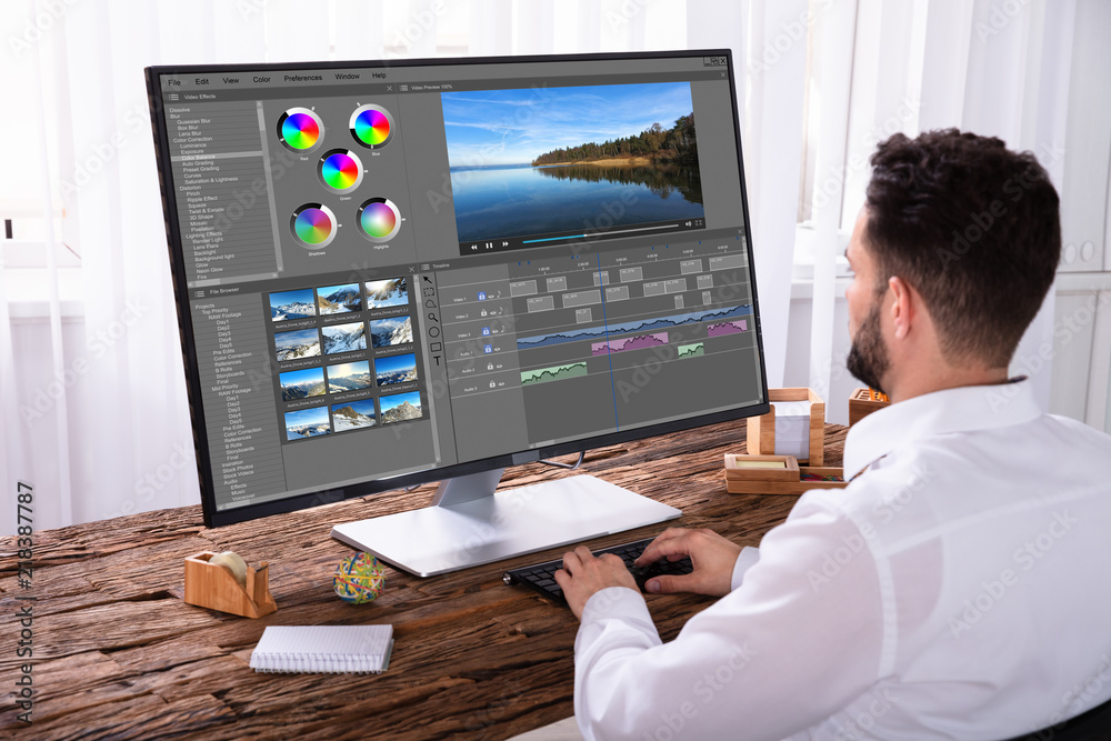 Poster Editor Editing Video On Computer