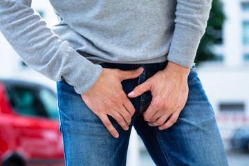 Man's Hand On His Crotch