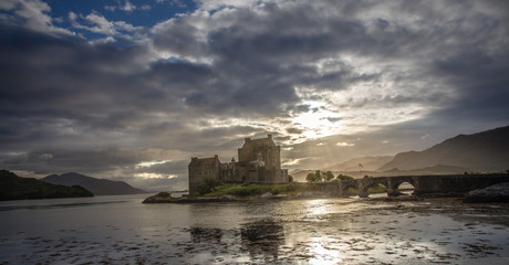Eilean Donan Castle with cloudy sunset sky  Highlands Scotland Landscape