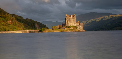 Eilean Donan Castle with cloudy sunset sky  Highlands Scotland Landscape