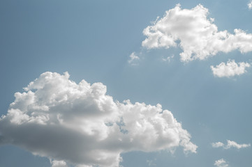 white clouds on blue sky at summer with sunshine