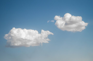 white clouds on blue sky at summer with sunshine