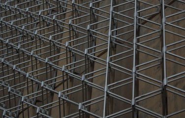 industrial metal frame construction on building wall background