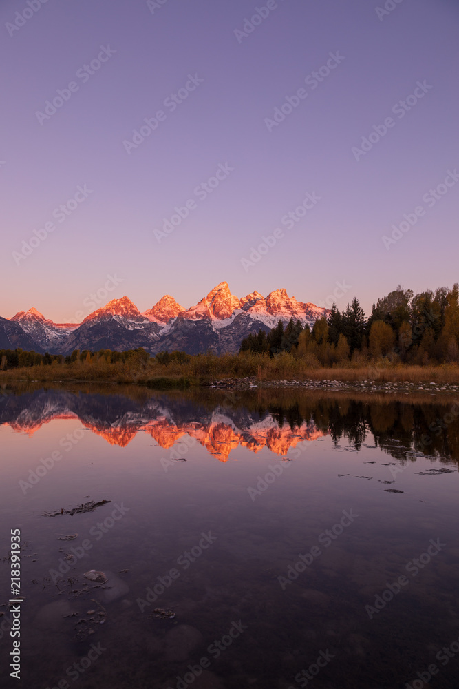 Wall mural Scenic Sunrise Reflection in the Tetons in Autumn