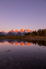 Scenic Sunrise Reflection in the Tetons in Autumn