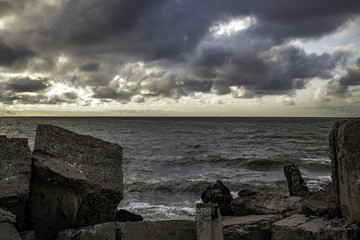 stones, sea, sky with clouds