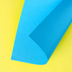 Blue and yellow paper. Geometric shapes. Abstract background