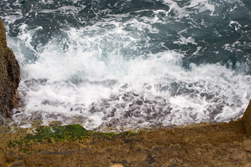 Saaidia island and waves and rocks