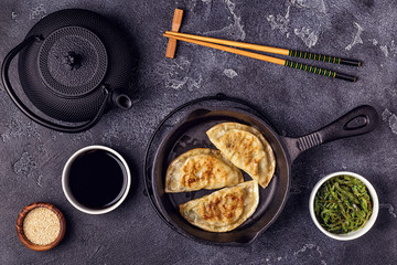 Gyoza or dumplings snack with soy sauce.