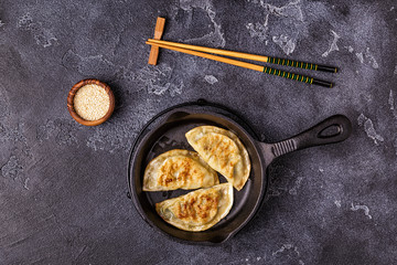 Gyoza or dumplings snack with soy sauce.