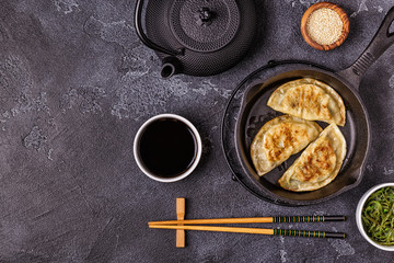 Gyoza or dumplings snack with soy sauce.