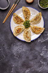Gyoza or dumplings snack with soy sauce.