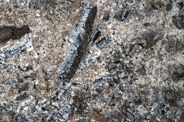 Hot ashes after a fire.