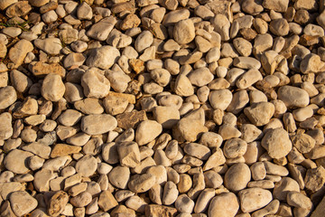 Many stones of different types of pebbles