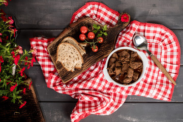 Beef meat stew in ceramic pot.