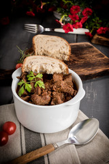 Beef meat stew in ceramic pot.