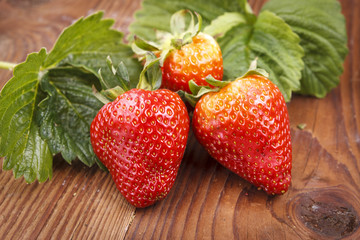 Close up of ripe strawberrys and leaves.