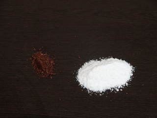 Crystallized alum chunks isolated on a black background, Alum Powder and Clove Powder, Fitkari and Clove Powder