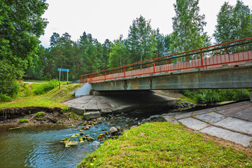 Fototapeta na wymiar River bridge. Chingisy, Novosibirsk oblast, Russia