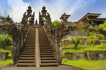 View to huge gate with stone dragons in Mother Temple Pura Besakih, Balinese largest Hindu temple...