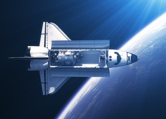 Fototapeta premium Space Shuttle Orbiter In The Rays Of Light