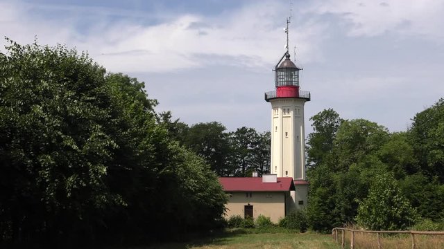 Observation tower. Lighthouse. Blue sky. Antenna,  Panning,Closeup, 