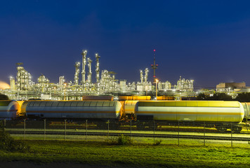 Chemical Plant And Railroad Cars At Night