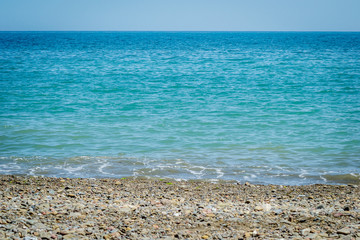 Jebha island and waves and rocks