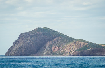 Saaidia island and waves and rocks