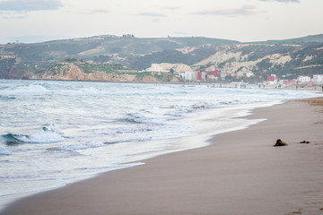 Saaidia island and waves and rocks