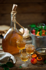 Apricot liqueur.style vintage. selective focus