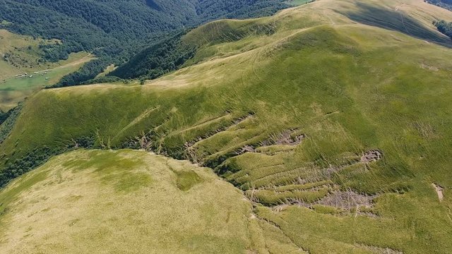 Aerial of a Carpathian gorge with some rocky drawings on a sunny day in summer