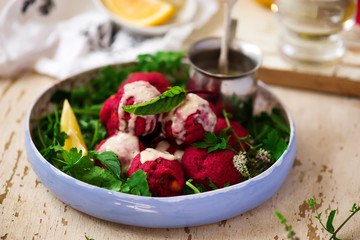  Beet falafel with tahina sauce and green salad
