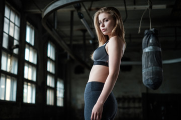 Female Boxer preparing for training in Boxing Club